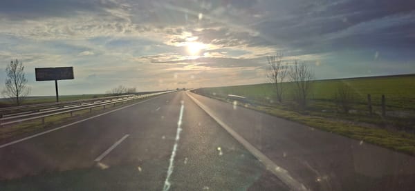 Highway scene captured under cloudy skies in Vodenichane, Bulgaria