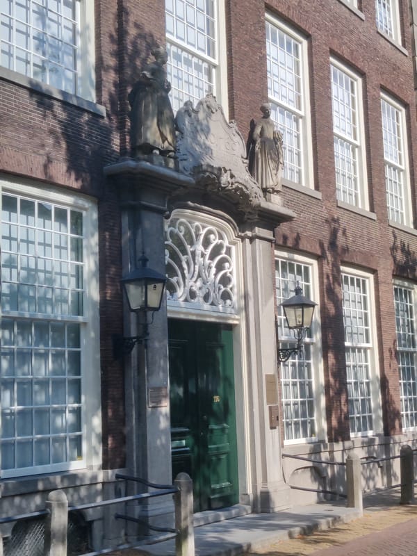 Wandering Delft's streets, canals, and facades on a July afternoon