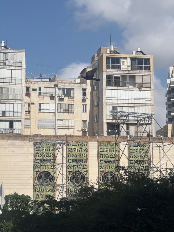 Apartment building with geometric tile patterns observed in Ramat Gan