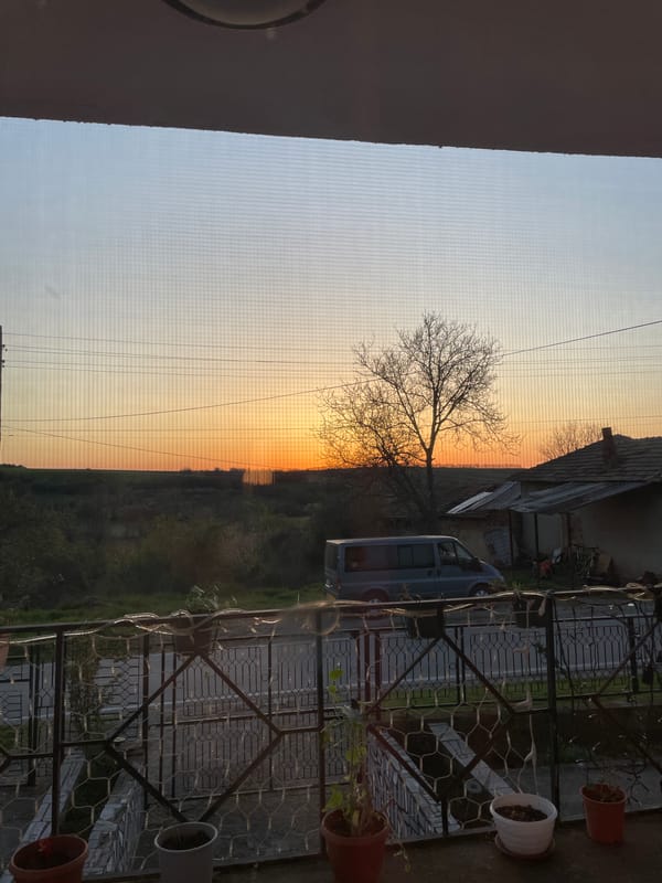 Sunset viewed from ornate balcony in Voditsa, Bulgaria
