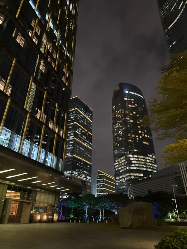 Haizhu District's nighttime skyline and streets, up close