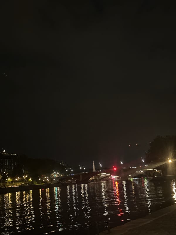 Nighttime Seine River scenes captured in Paris