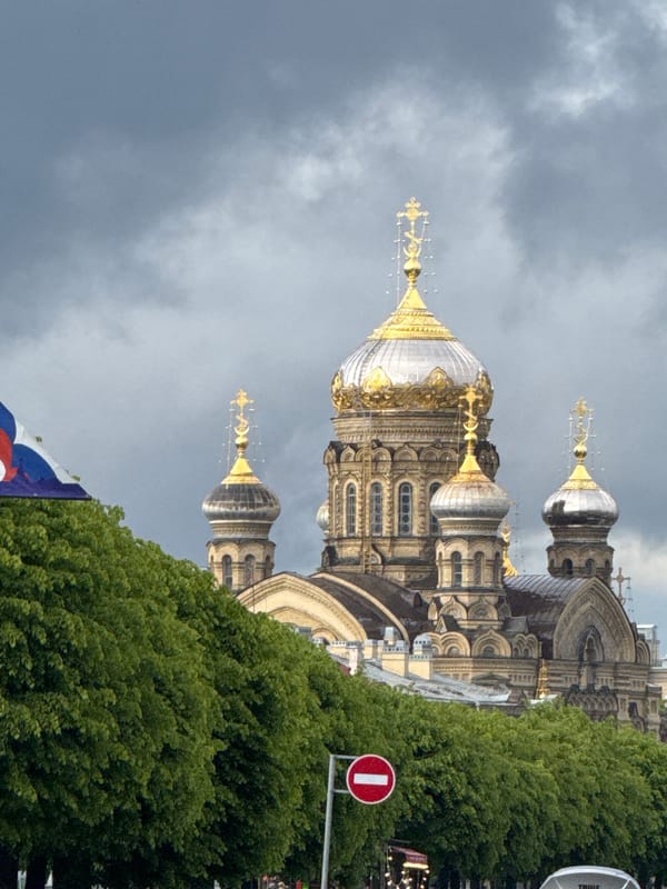 Orthodox church and icebreaker Krasin spotted under overcast skies