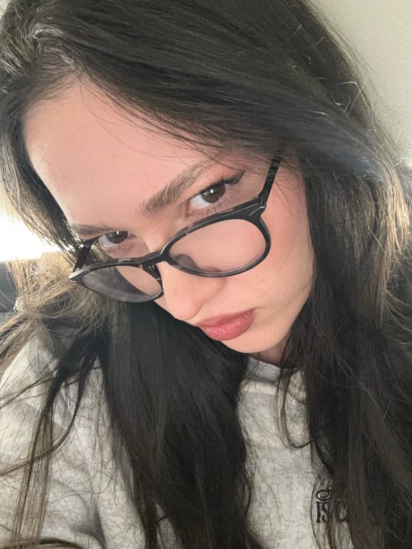 Woman enjoys playful coffee shop moment in Yerevan