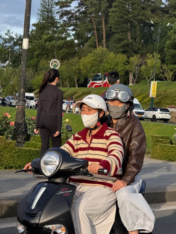 Everyday street life on scooters and sidewalks in Da Lat