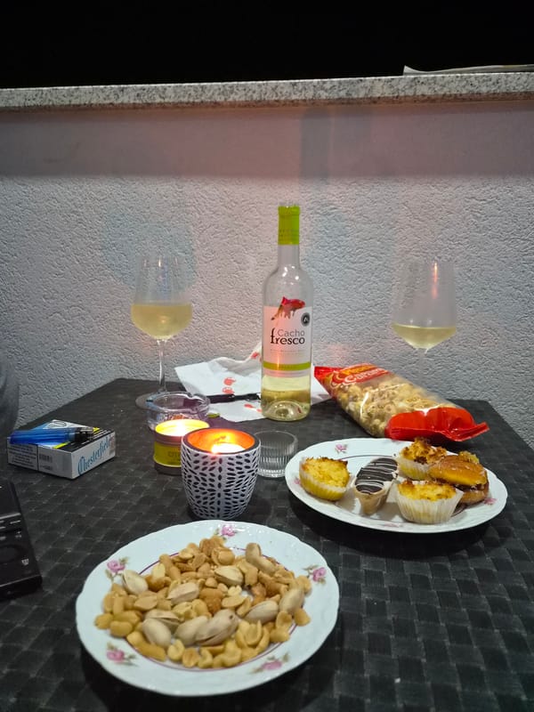 Quiet evening documented in Barcelos home with wine, candles