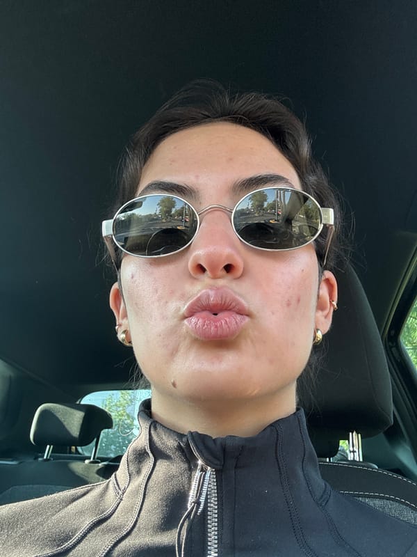 Woman takes selfie in Puebla bathroom