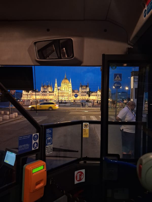 Budapest's Parliament and Batthyány tér glowing at dusk
