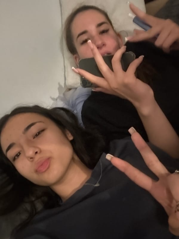 Two women pose for indoor photo in Vratsa, Bulgaria