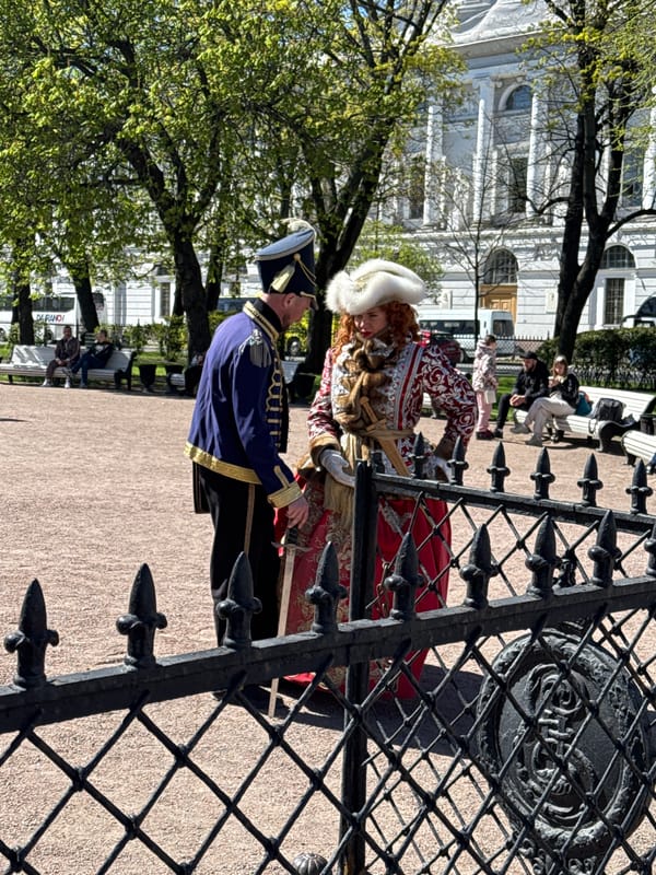 Tourist activity documented at Saint Petersburg's Palace Square monuments