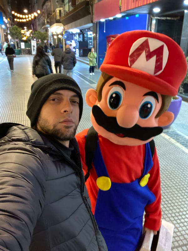 Mario mascot entertains pedestrians on Buenos Aires street