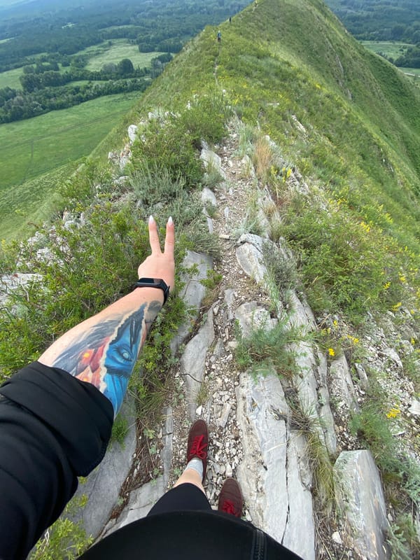 Mountain hiking adventure in Verkhnyaya Chernorechka with memorial cairn
