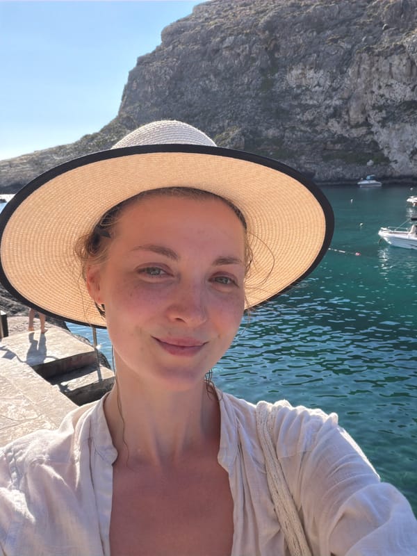 Xlendi Bay buzzing on a sunny Maltese summer afternoon