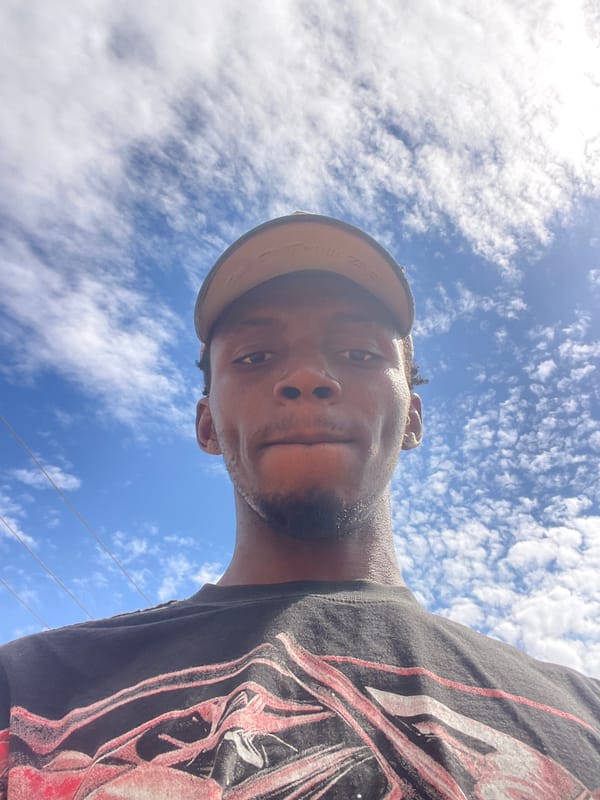 Young man photographs himself drinking, taking selfies in Lokoja