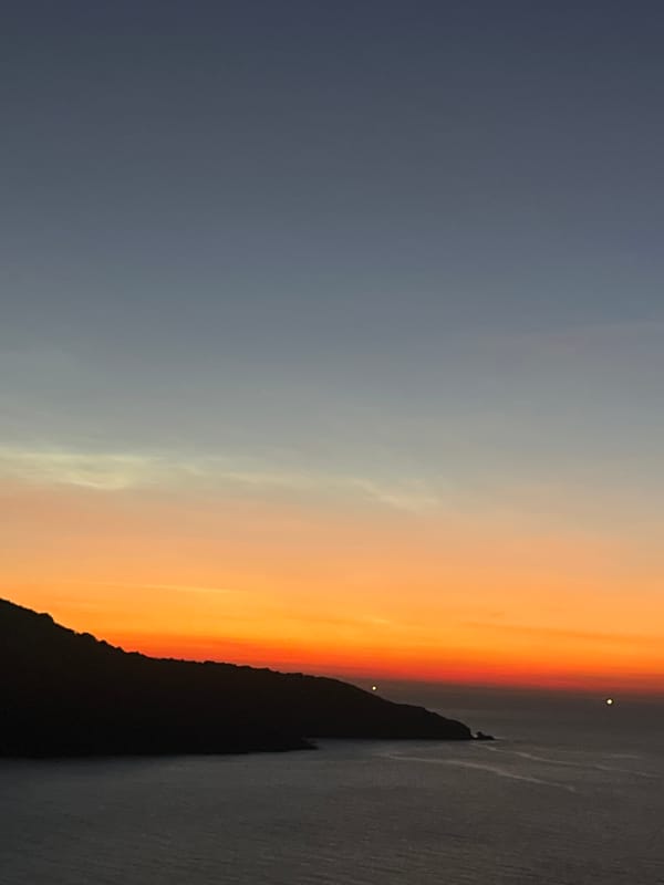 Sunset gathering on a Da Nang clifftop overlooking the sea