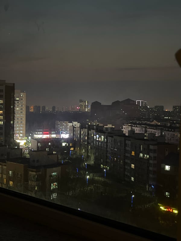 Night cityscape views captured through windows in Changchun