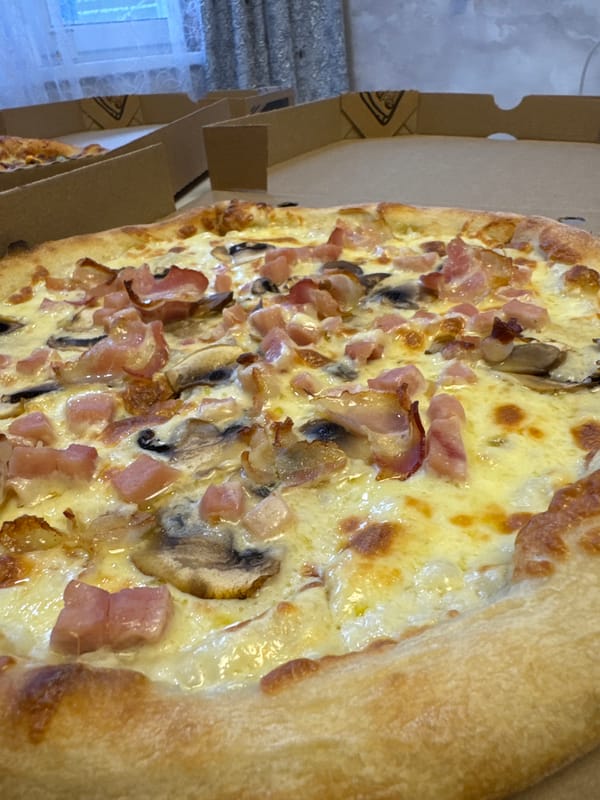 Ham and mushroom pizza fresh in the box, Vladivostok