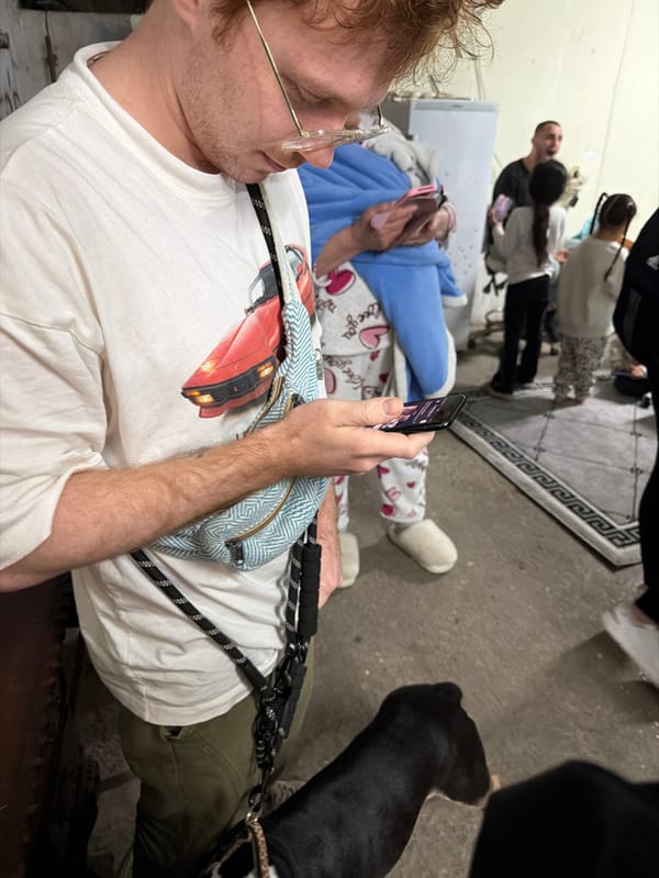 People gather in Tel Aviv area shelter, watch news