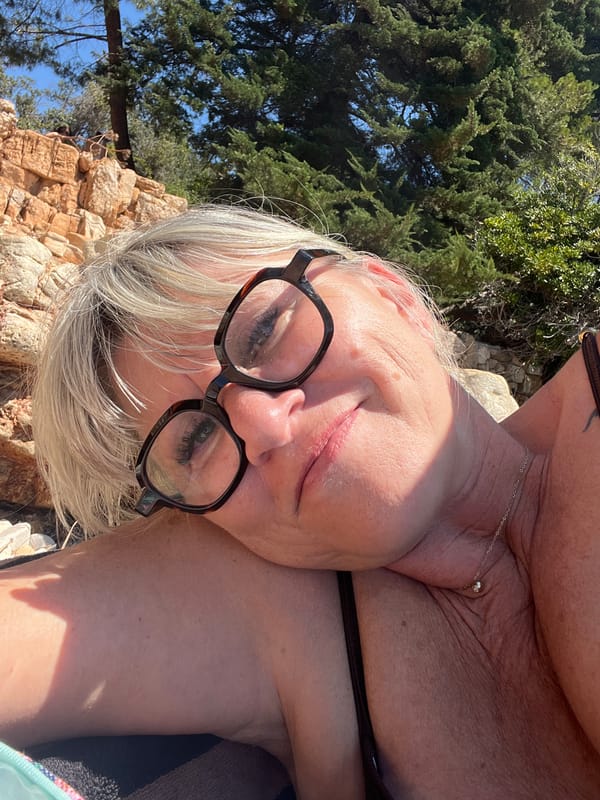 Lazy morning on a Cannes pebble beach with a hashtag drop