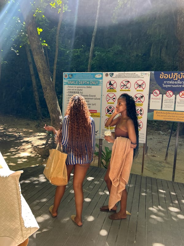 Ao Nang beach and boardwalk on a busy tropical afternoon