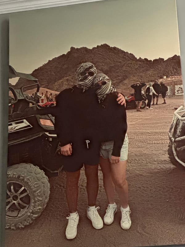 Domestic scenes documented featuring desert embrace artwork, vanity setup