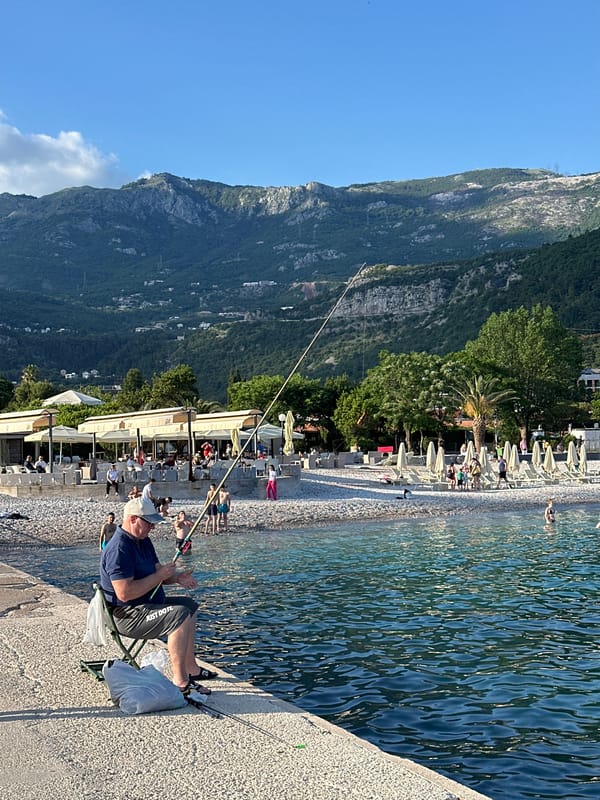 Ordinary beach day captured across Budva's Adriatic coastline