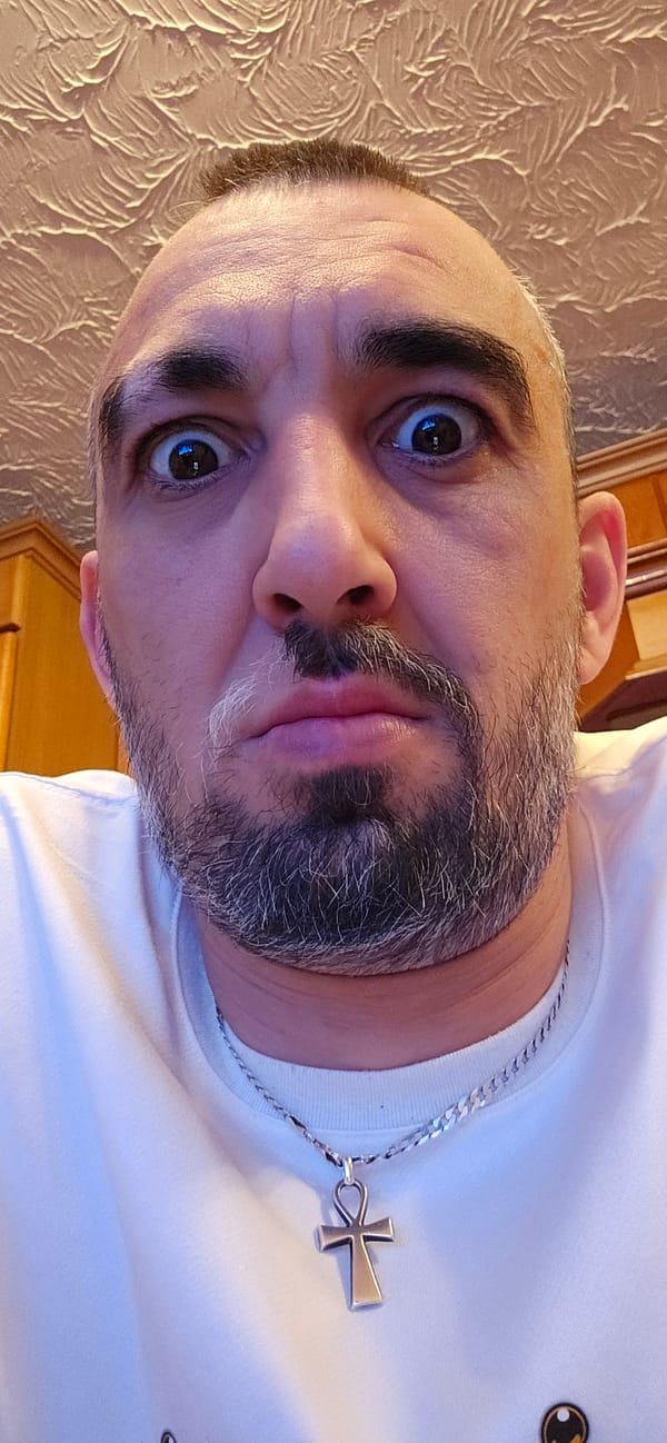 Man photographed in Norwich home, multiple angles captured