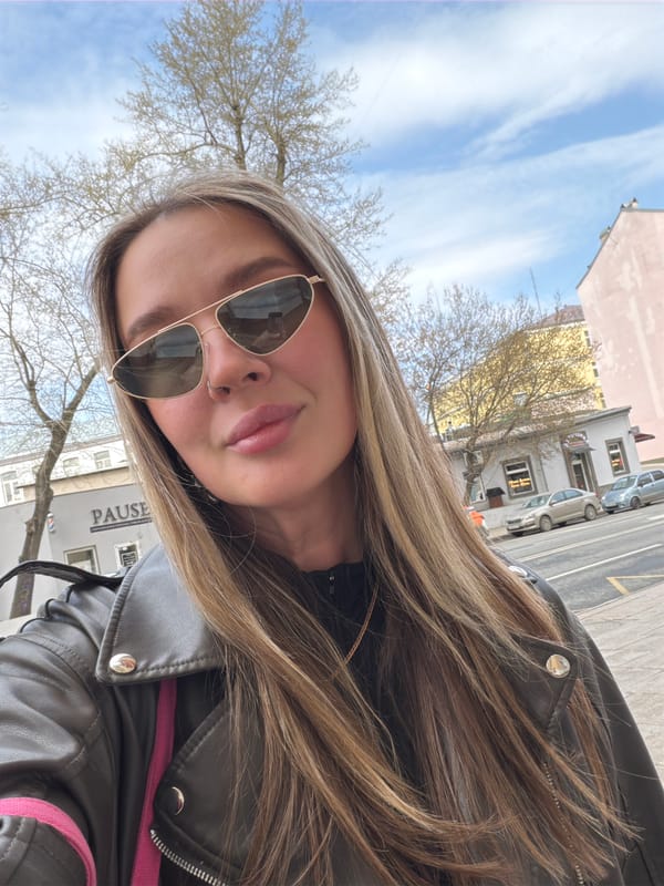 Woman takes selfie on sunny morning in Moscow