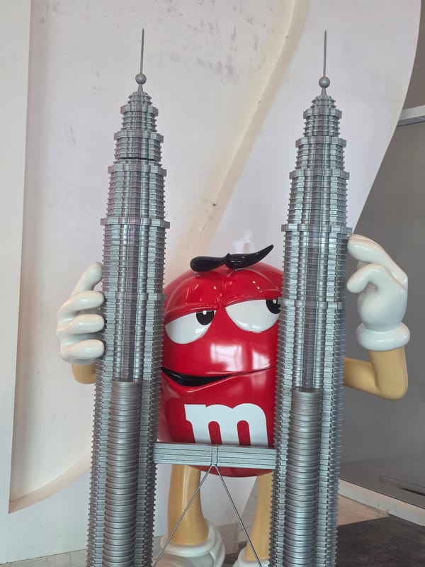 Airport scenes and M&M display captured in Sepang