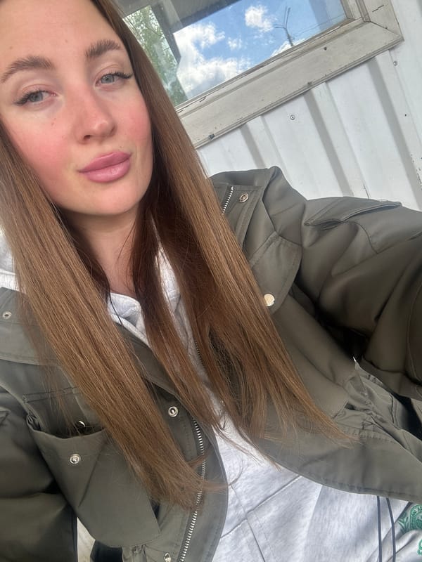 Woman visits transportation hub in Chaikovsky, Russia morning hours