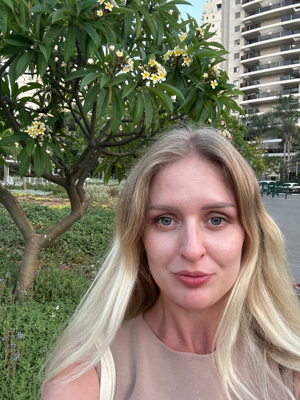 Selfie series on a Petah Tikva sidewalk, July 2026