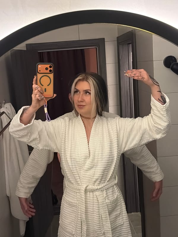 Woman takes mirror selfies in Belgrade bathroom