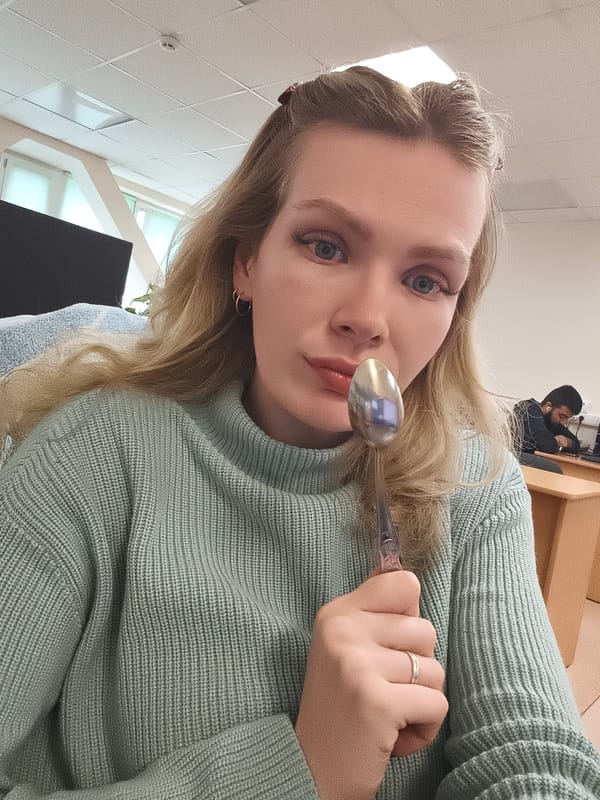 Woman with spoon photographed in Izhevsk, Russia