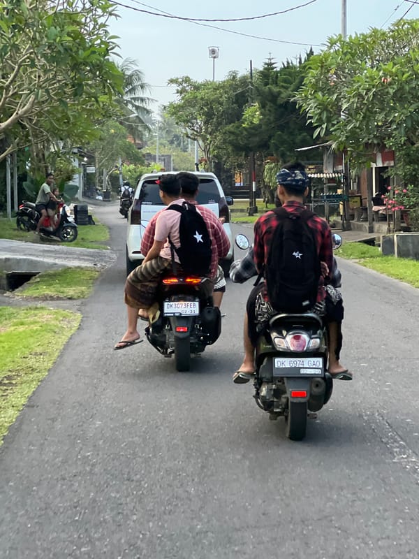 Scooters spotted on road in Singakerta, Indonesia