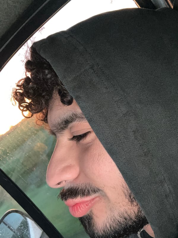 Hooded figure photographed in early morning Villejust