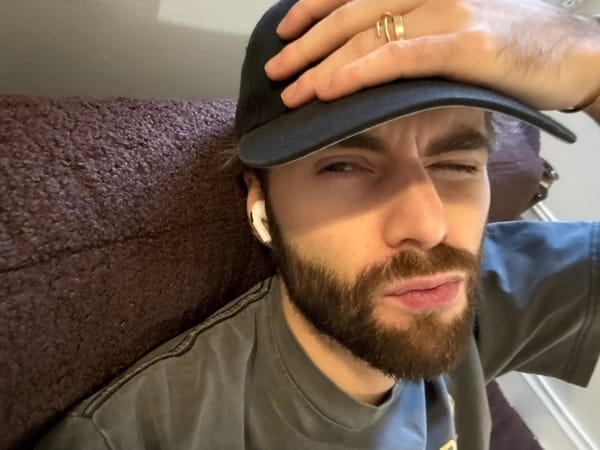 Man resting indoors captured in Montreal residential setting