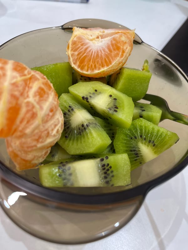Evening fruit salad meal captured in Pernik home