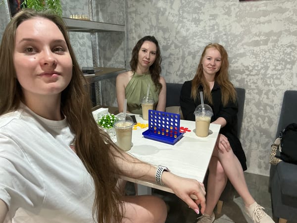 Cafe hangout in Chaikovsky, iced coffee on the table