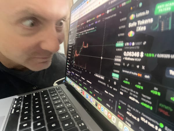 Man observed working on laptop indoors in Sukawati