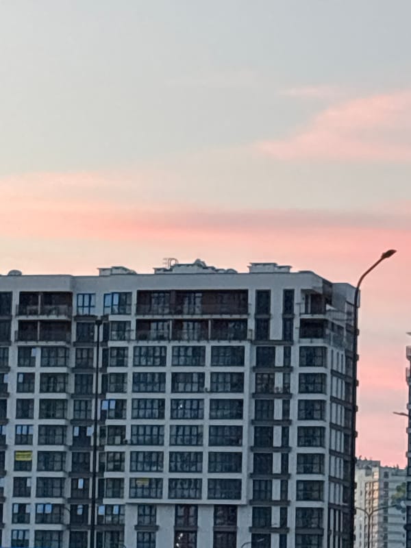Minsk residential towers at dusk, July evening
