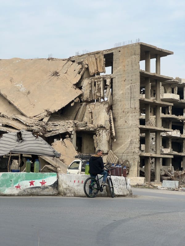 Daily life documented amid damaged buildings in Damascus area