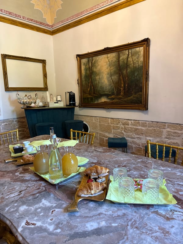 Morning breakfast service documented at ornate Giovinazzo establishment