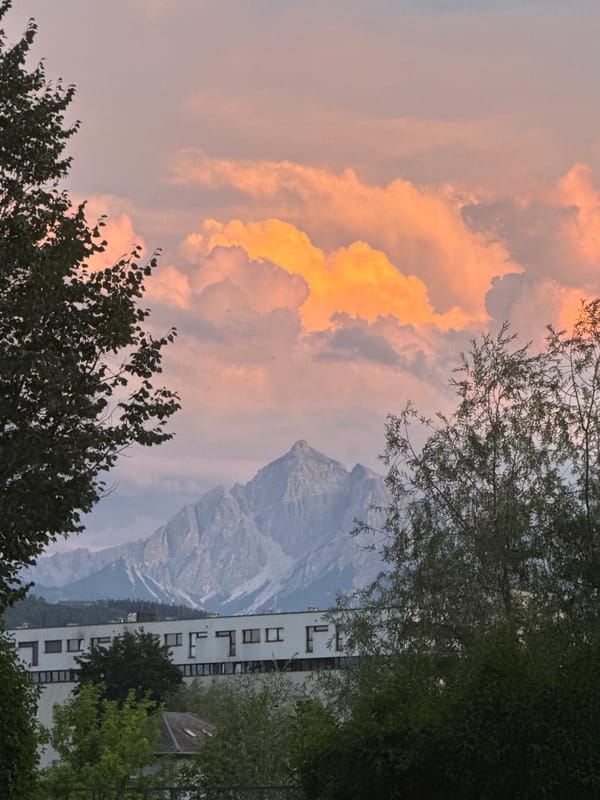 Nordkette mountains glow at sunset above Innsbruck