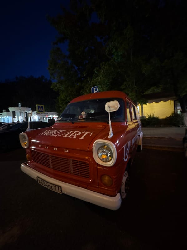 Seafood dinner documented at Anapa restaurant with vintage van