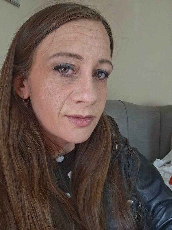 Woman with brown hair observed in Bulgarian village