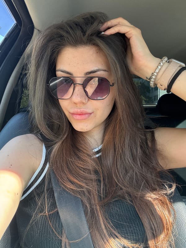Woman photographed in passenger seat of car in Sofia