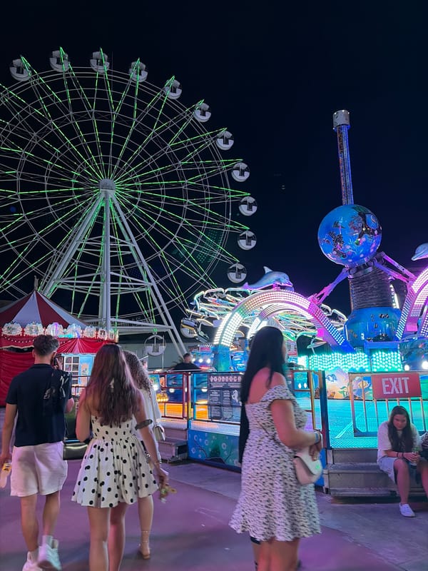 Nesebar amusement park lit up on a summer night