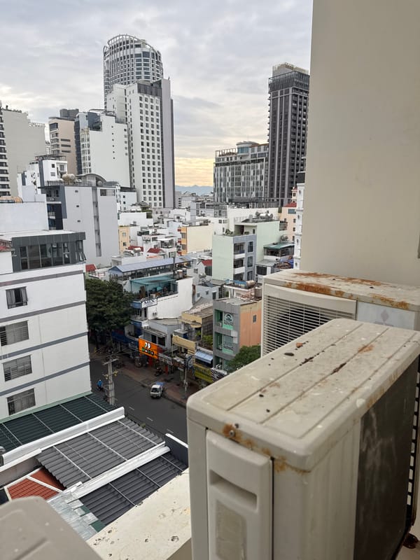 Coffee and city views from a Nha Trang hotel room