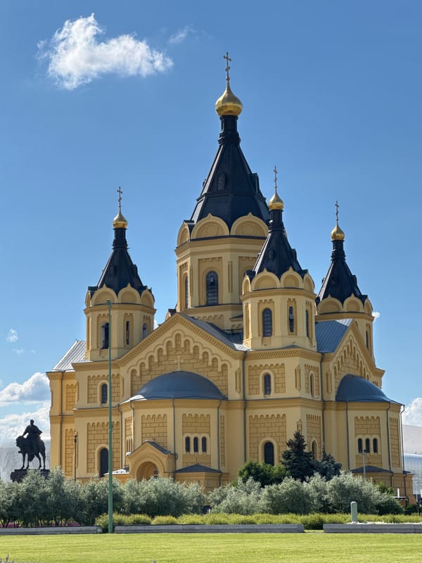 Nizhny Novgorod's cathedral and riverfront on a clear summer day