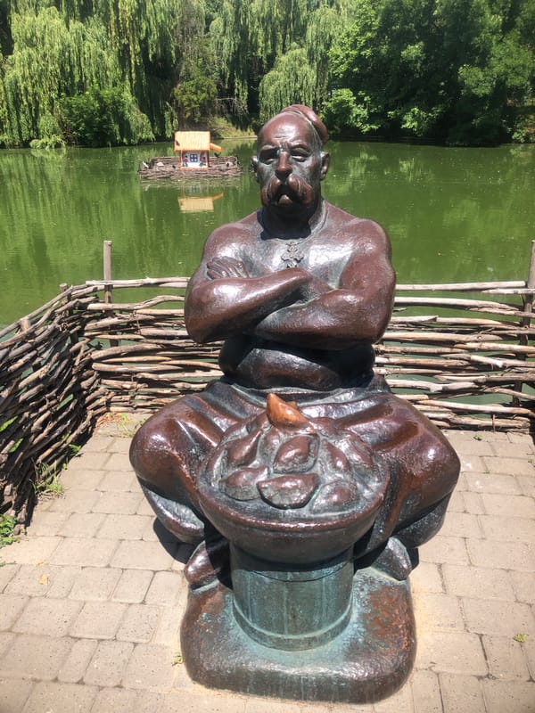 Bronze statues, church domes, and wildlife at a heritage park
